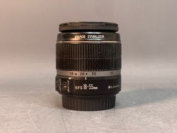 Canon EF-S 18-55mm 3.5-5.6 IS, царапка на передней линзе