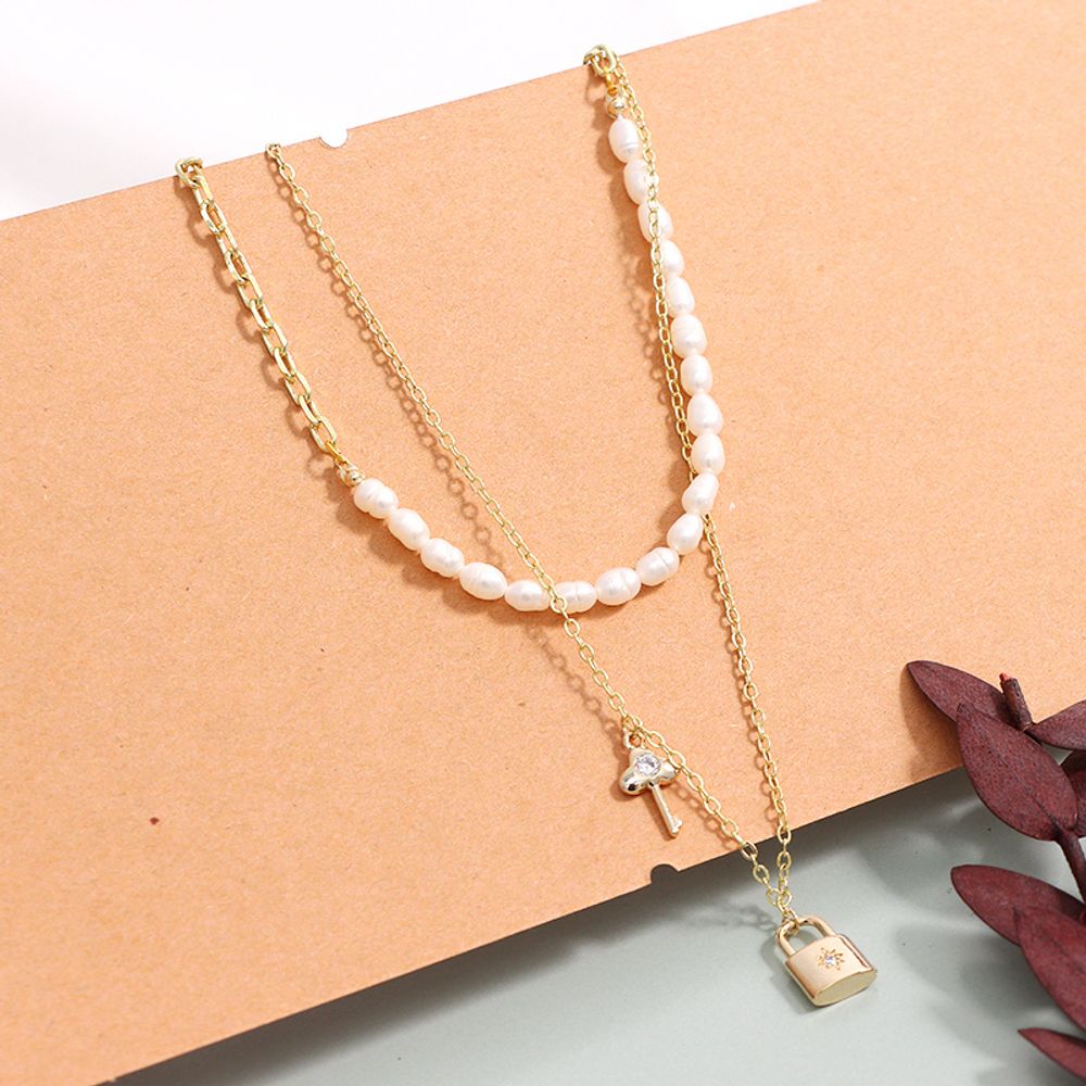 Ожерелье из искусственного жемчуга "Pearl Key" Ожерелье из искусственного жемчуга "Pearl Key"