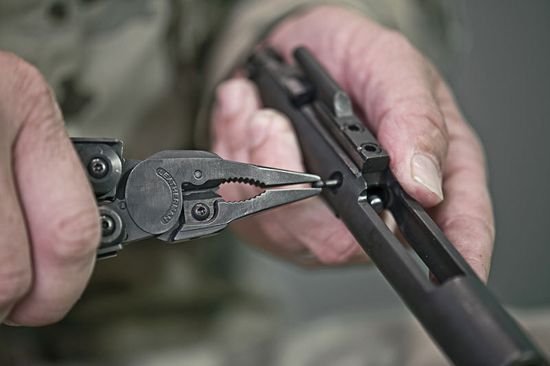 Мультитул-инструмент Leatherman Мод. MUT BLACK (16 инструментов)(12,7см)(317г.)(чехол: нейлон MOLLE-GREEN)