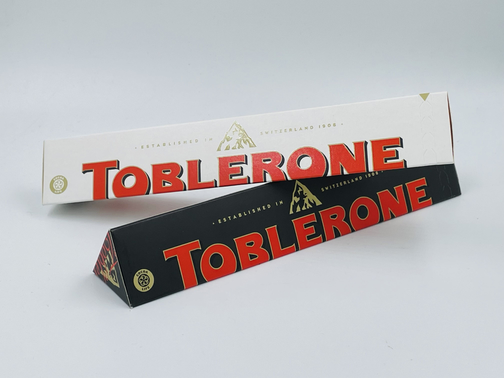 Toblerone темный шоколад с медом и нугой 100 г + белый шоколад с медом и нугой 100 г (Швейцария)