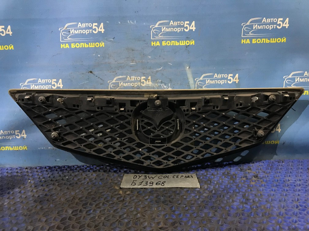 Решетка радиатора MAZDA DEMIO 2002-2005