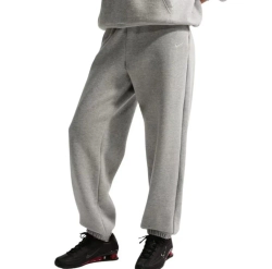 Женские теннисные брюки Nike Studio Fleece Medium Weight - dark grey heather/sail