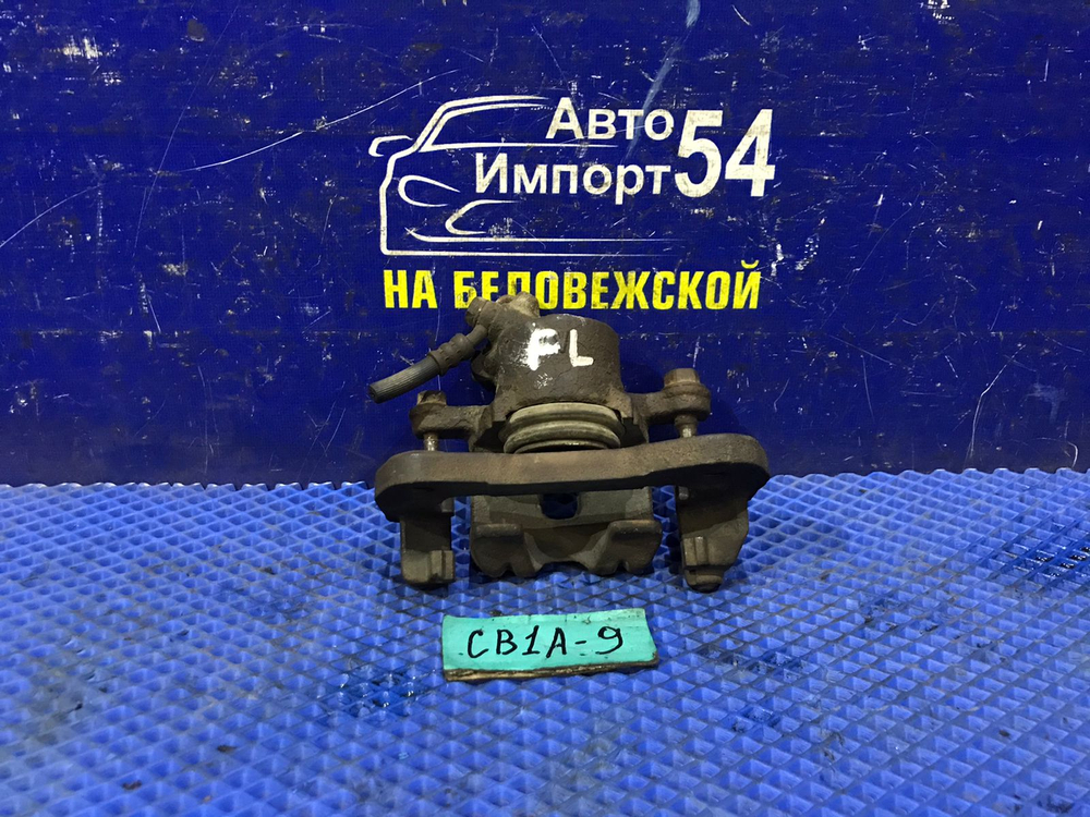 Суппорт тормозной передний левый MITSUBISHI LANCER 1994