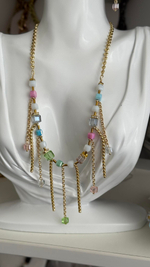 Колье из микса кубиков Swarovski с подвесами-цепочками, оттенок золото