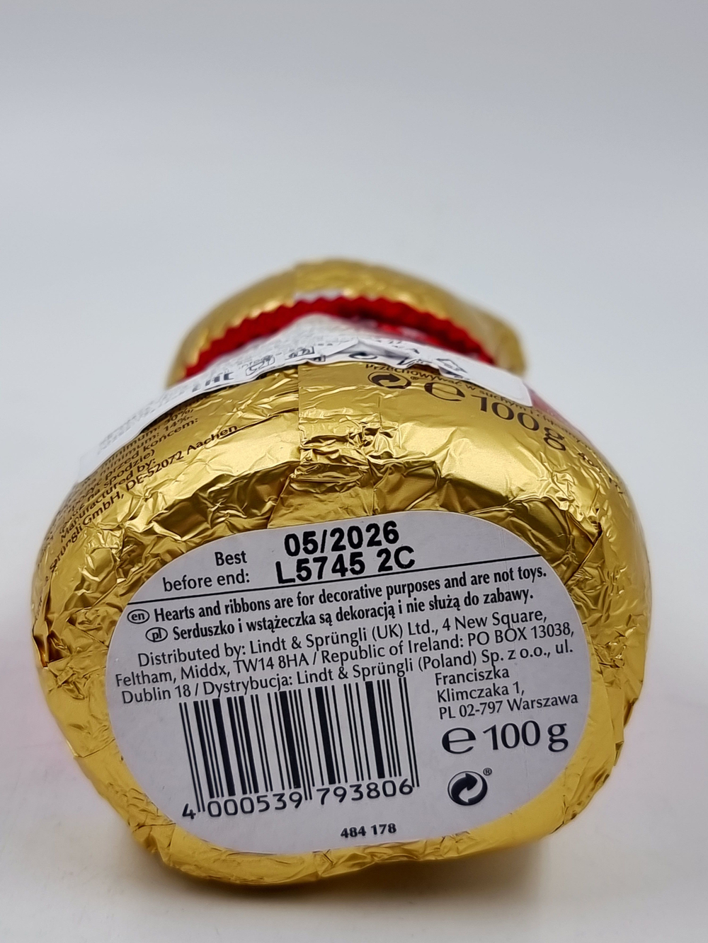 Lindt Teddy Шоколад молочный в форме Мишки, красный/розовый 100 г 1 шт (Германия)