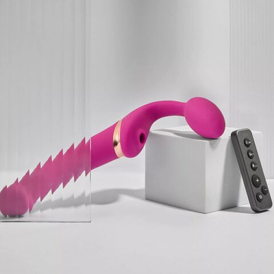 Ярко-розовый безремневой страпон Multi Orgasm Bendable Strap-On size L с клиторальной стимуляцией (Цвет: ярко-розовый)