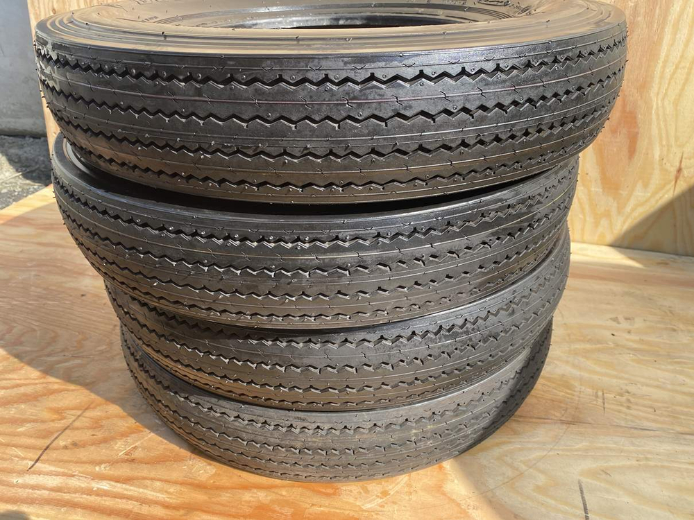 Dunlop taxi master 5.60R13  4шт.