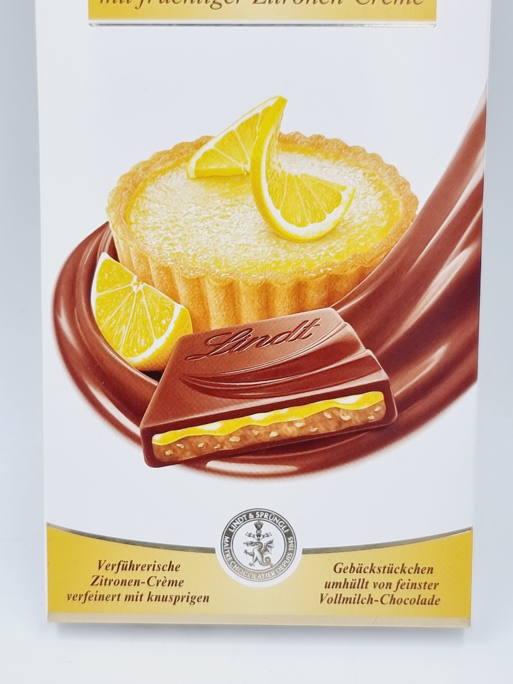 Молочный шоколад Lindt Creation Tarte au Citron с лимонной начинкой с кусочками песочного печенья 150 г (Из Финляндии)