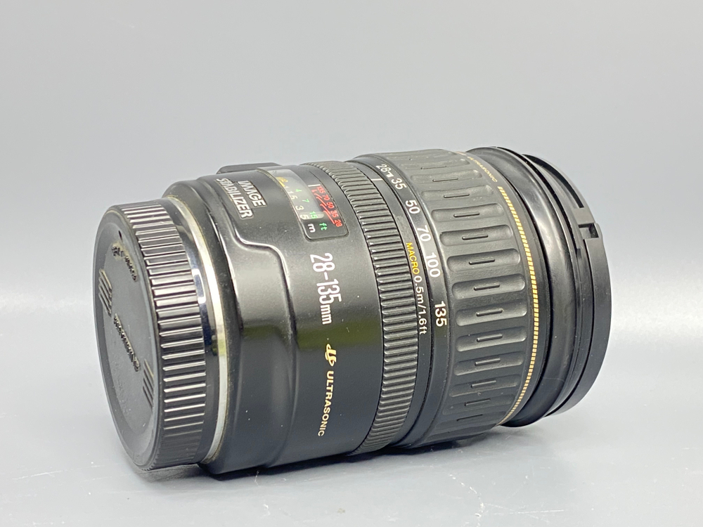 Canon 28-135mm IS внутри пыль