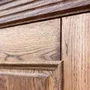 Межкомнатная дверь массив дуба без сучка с багетом Болонья глухая дуб коньяк
