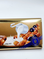 Шоколад Lindt Swiss Premium Chocolate молочный с изюмом и цельным фундуком 300 г (Швейцария)