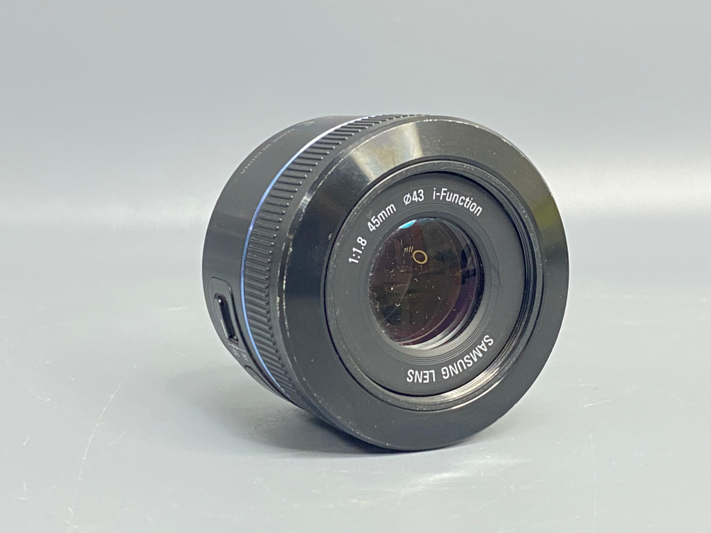 Samsung 45mm f/1.8 пыль внутри объектива