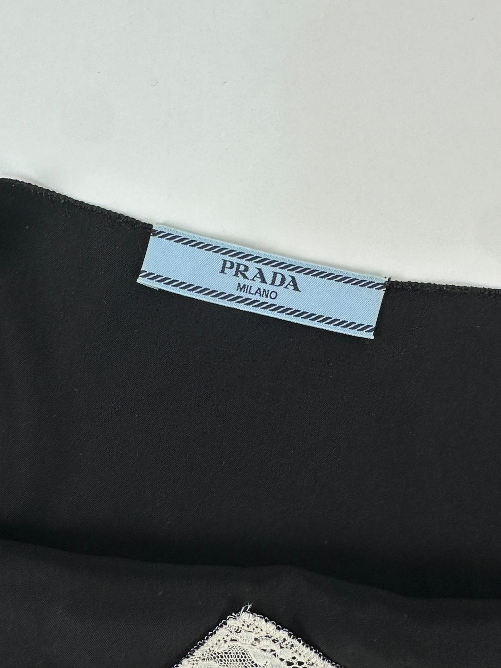 Топ Prada