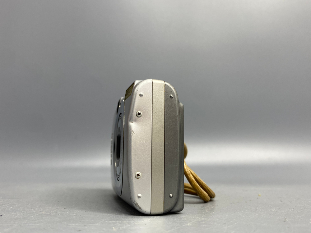 Canon Digital IXUS 950 IS, объектив шумит