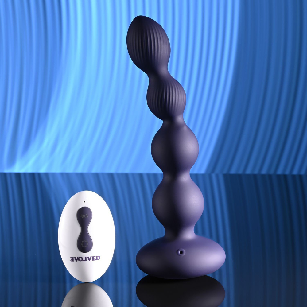 Фиолетовые анальные бусы с вибрацией и вращением Pleasure Orbit - 17,8 см.