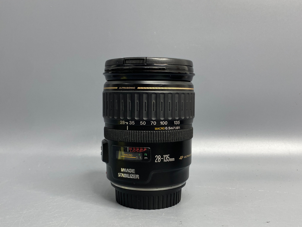 Canon EF 28-135mm 3.5-5.6 IS USM царапка на передней линзе