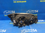 Фара передняя левая MAZDA FAMILIA 2000-2003