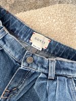 Джинсы Gucci, 86