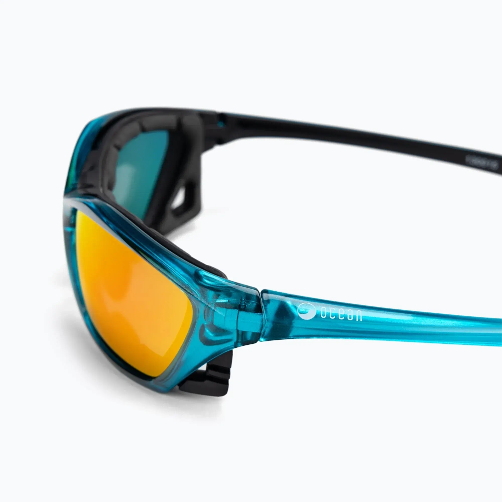 Спортивные очки OCEAN Lake Garda Transparent Blue / Revo Orange Polarized lenses