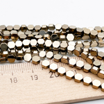 Гематит Шестигранник бусины (имитация), цвет золотистый, размер около 4*4,2 мм, цена за отрезок 19 см (1/2 нити)