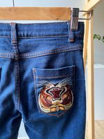 Джинсы Gucci, 140