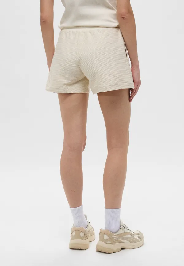 Шорты спортивные женские PUMA PREMIUM ESS A-Line Shorts 4' Jacquard
