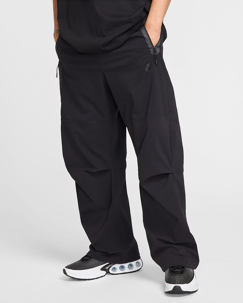 HM7158-010 Брюки M NK TCH WVN PANT OS