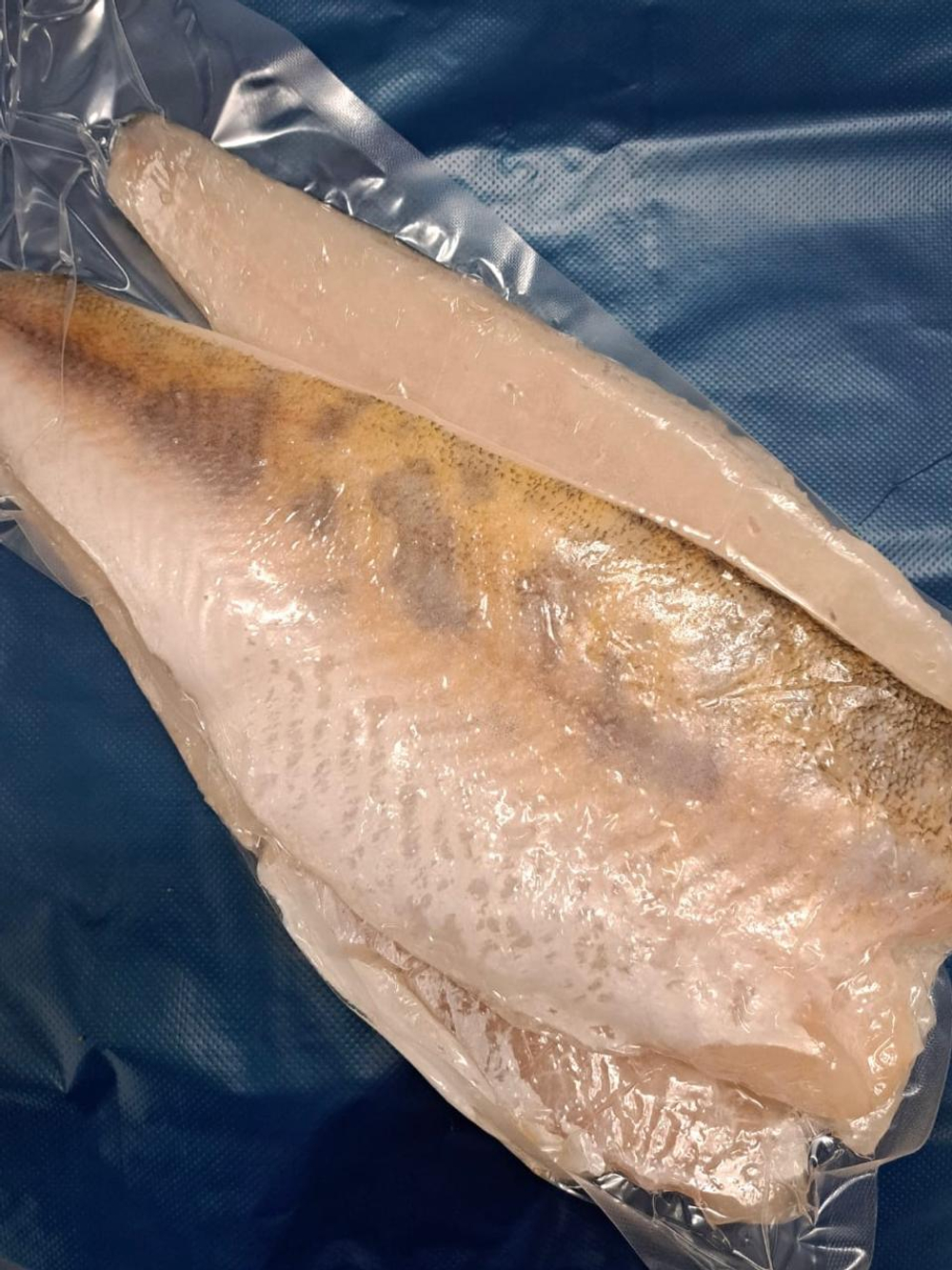 Филе судака на шкуре, вакуум. упак., весовой, цена за кг