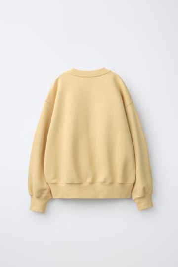 ZARA ОДНОТОННАЯ ТОЛСТОВКА С ЛОГОТИПОМ, ЖЕЛТЫЙ
