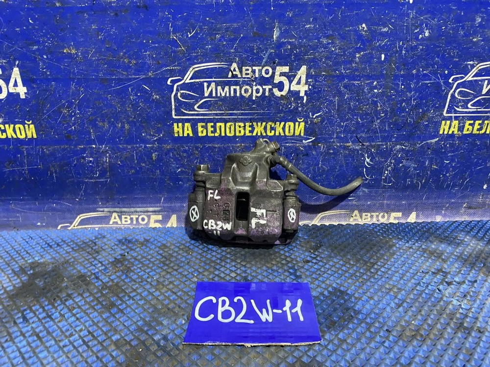 Суппорт тормозной передний левый MITSUBISHI LIBERO 2001