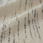 Шерстяная портьерная ткань «Ivory Pinstripe Bouclé» — плотное букле с вертикальной графитовой полосой для штор от пола до потолка