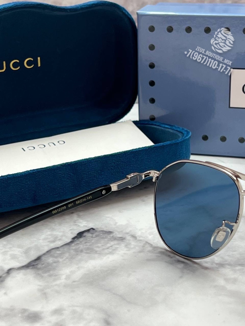 Солнцезащитные очки Gucci