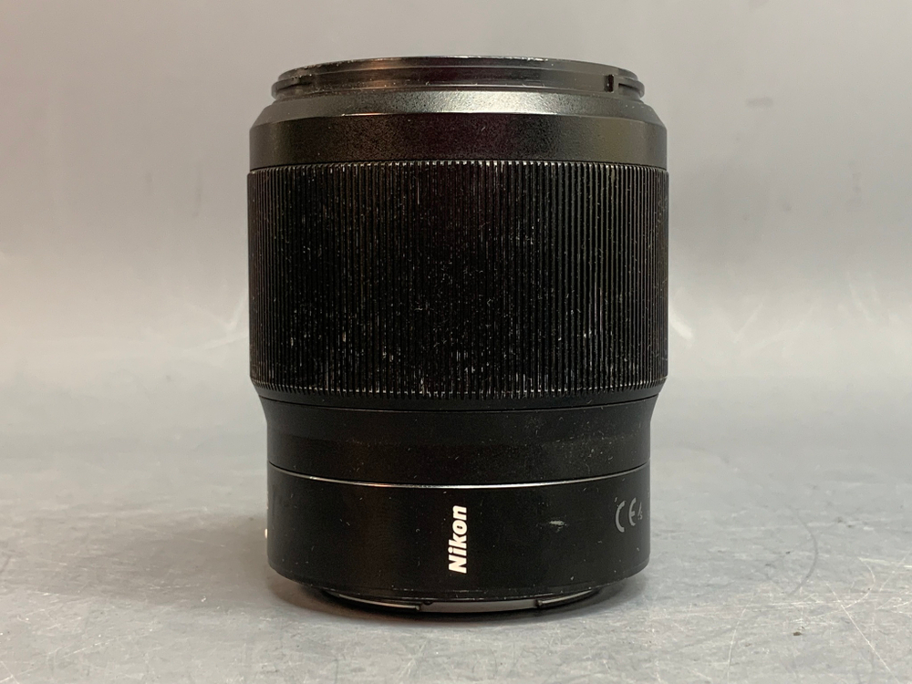 Nikon 50mm 1.8S Nikkor Z Царапина в внутри линзы