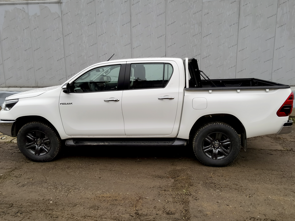 Крышка HAL 4-х секционная Hilux Revo '15, Араб. версия, с вкладышем и защитой стекла