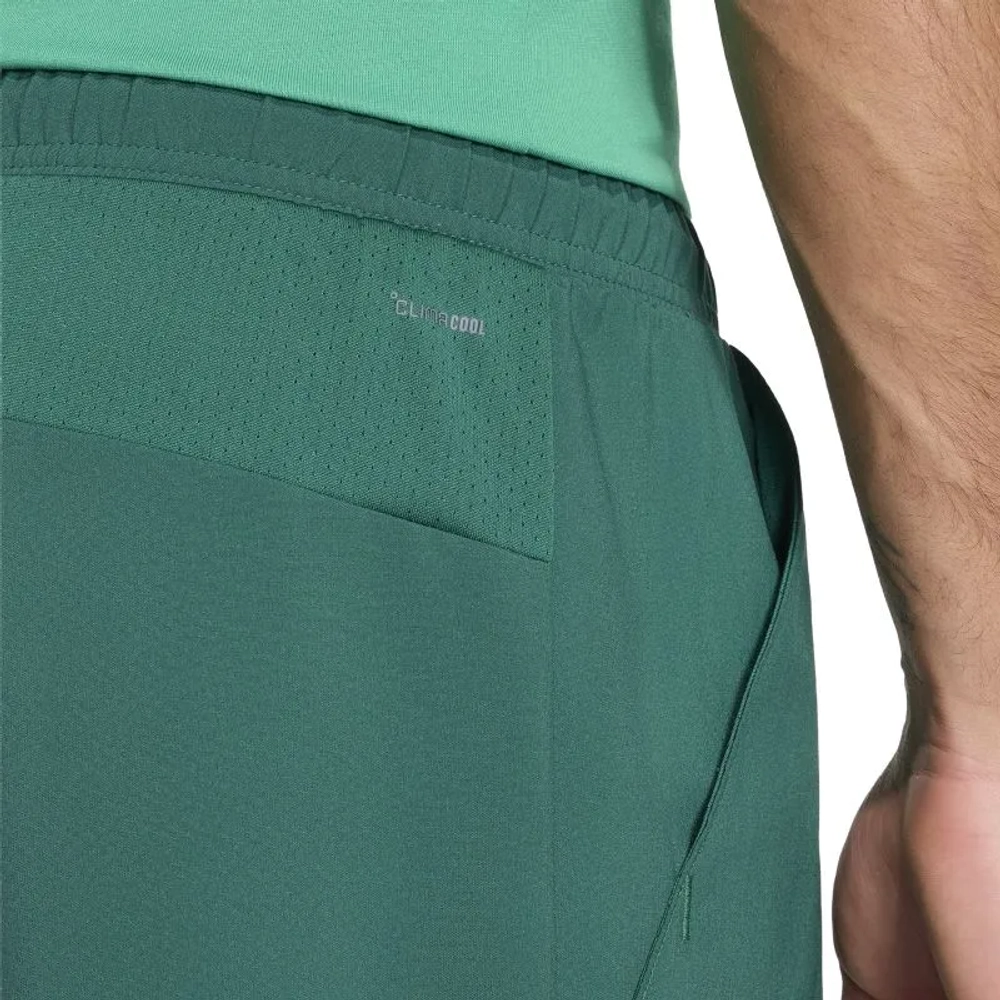 Мужские теннисные шорты Adidas Club 2in1 - collegiate green/semi court green