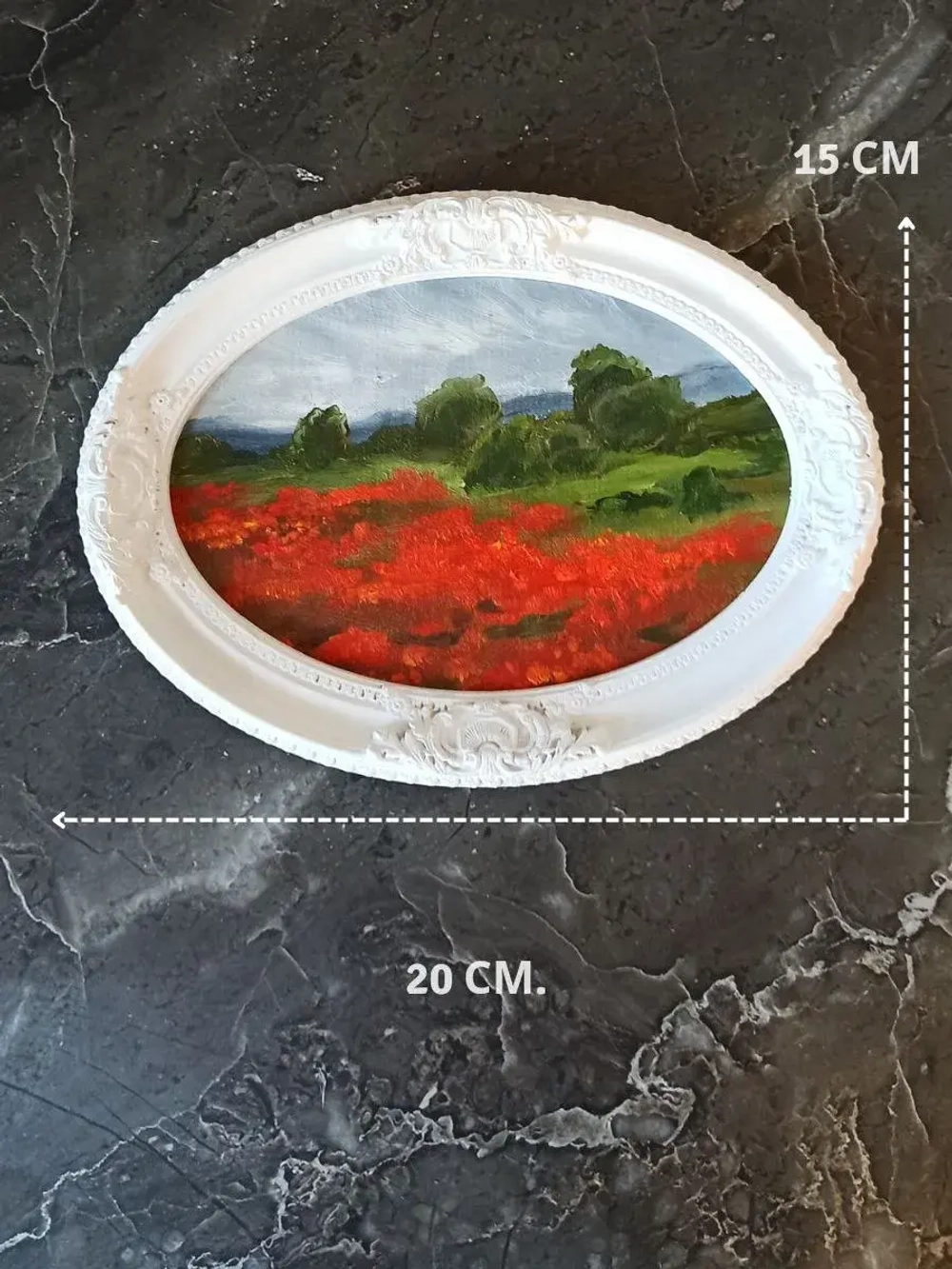 Картина в овальной рамке