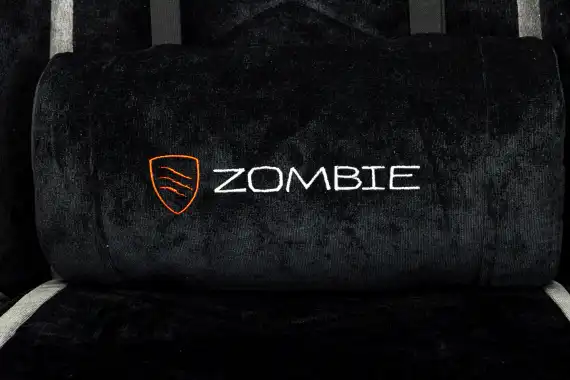 Кресло игровое Zombie Drift/F черный/серый крестов. пластик подст.для ног