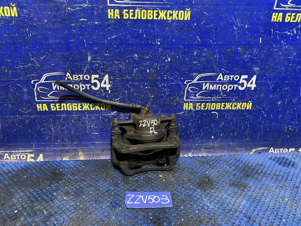 Суппорт тормозной передний левый TOYOTA VISTA 1999