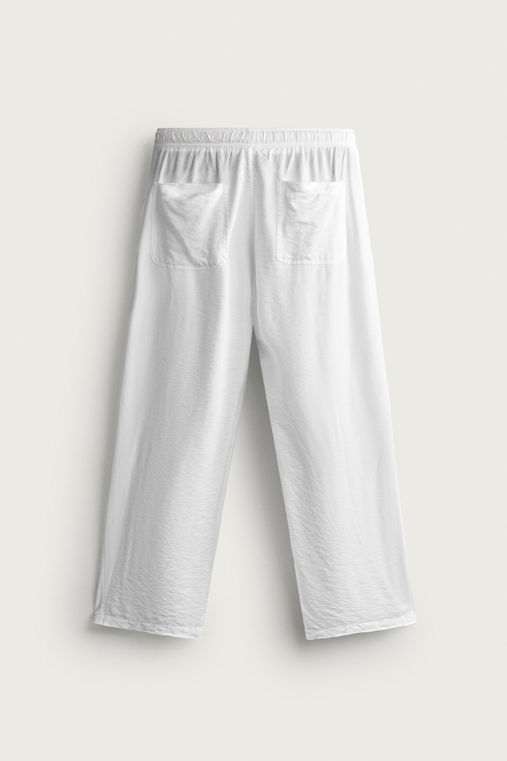 БРЮКИ RELAXED FIT ИЗ СТРУЯЩЕЙСЯ ТКАНИ — ZARA · 7446/306