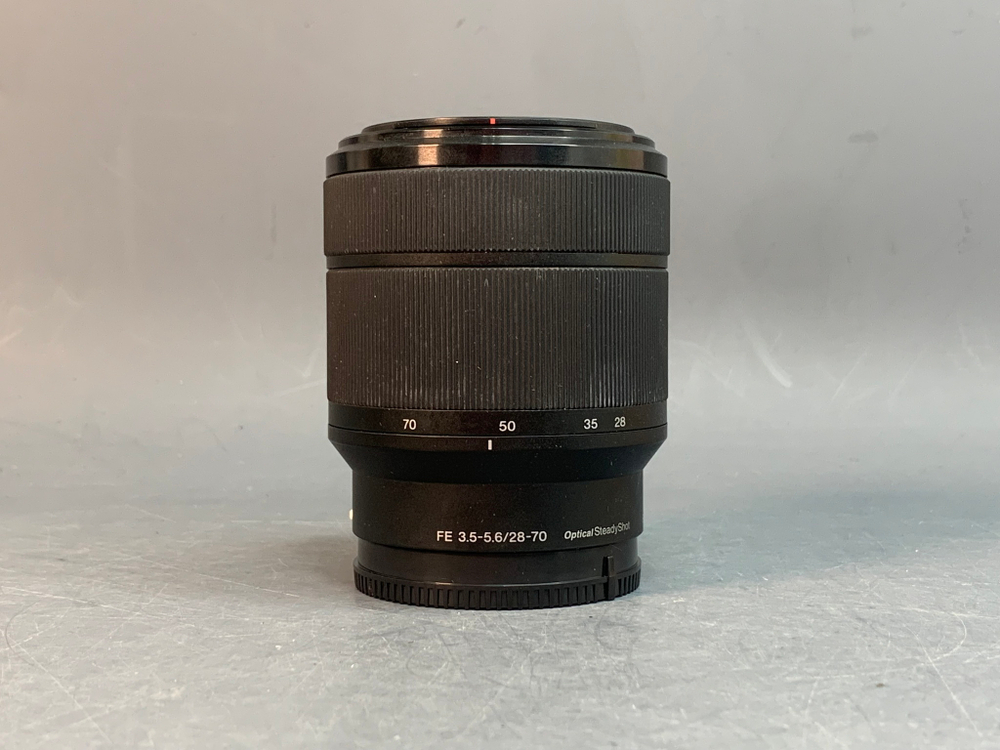 Sony FE 28-70mm f/3.5-5.6 OSS, царапки на передне линзе