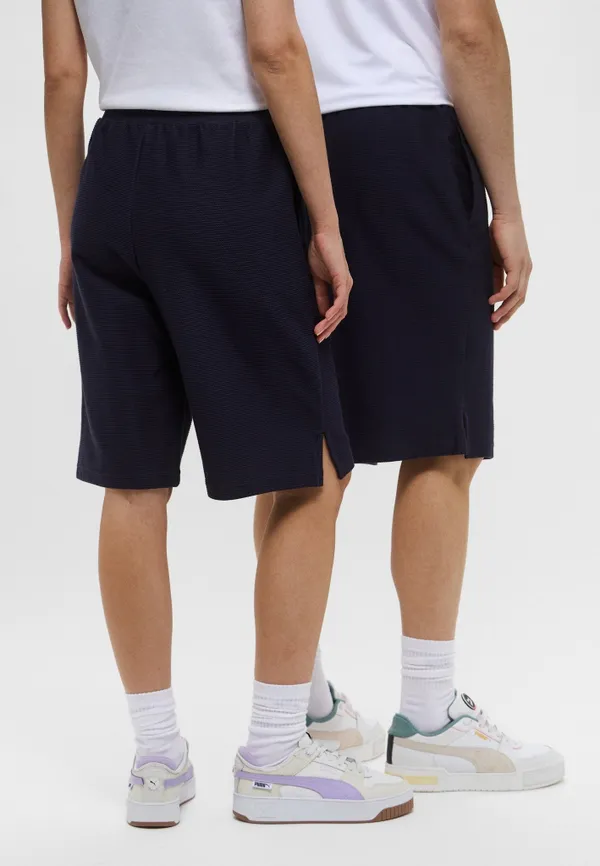 Шорты спортивные мужские PUMA PREMIUM ESS Jacquard Long Line Relaxed Shorts 11"