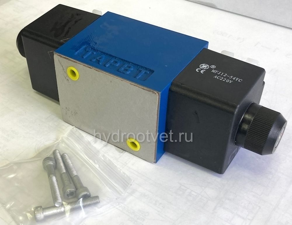 4WE10C31/OFCW220-50N9K4 - Гидрораспределитель золотниковый Ду 10 с электроуправлением W230, схема C (574/ОФ), возврат - OF = без пружины, с фиксатором