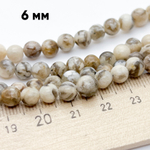 Пегматит бусины, диаметр 6-6,5 мм, цена за 28-29 шт (1/2 нити)