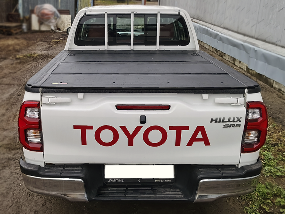Крышка HAL 4-х секционная Hilux Revo '15, Араб. версия, с вкладышем и защитой стекла