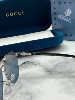 Солнцезащитные очки Gucci