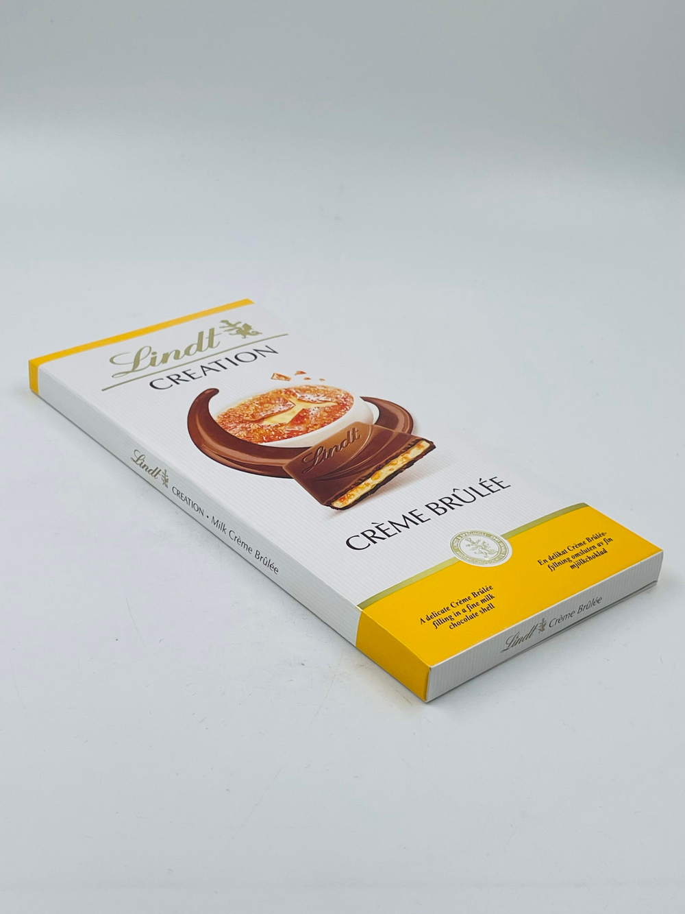 Шоколад молочный Lindt Creation с начинкой Крем-брюле,150 г (Франция)