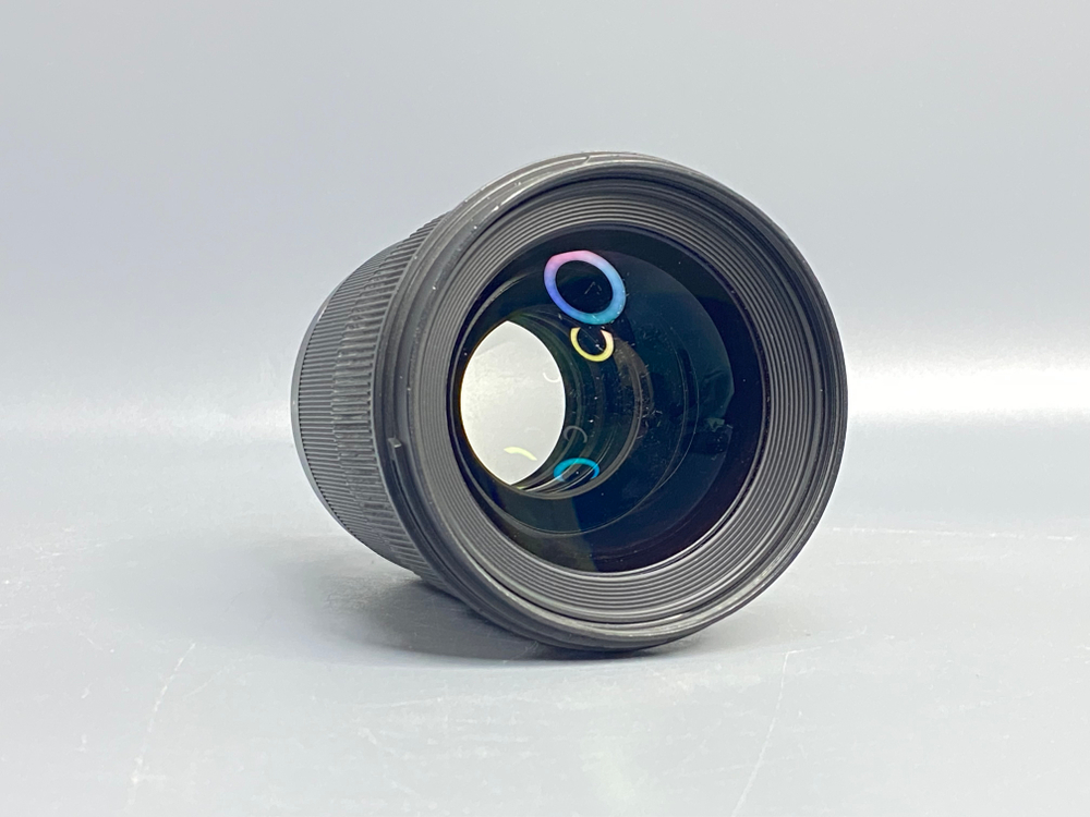 Sigma AF 50mm 1.4 DG HSM Art Canon EF царапки на линзе