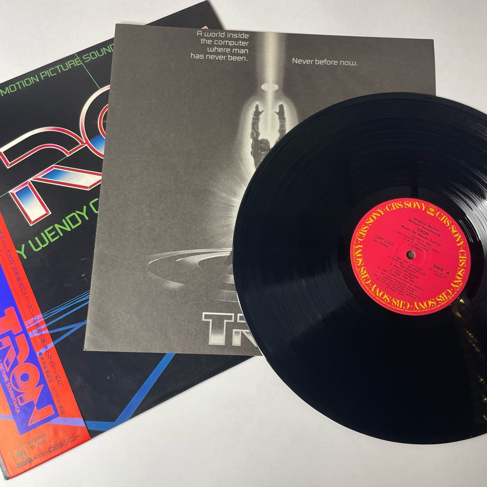 Винтажная виниловая пластинка LP Wendy Carlos Фильм Трон Tron Motion Picture Soundtrack (Japan 1982) (Obi)