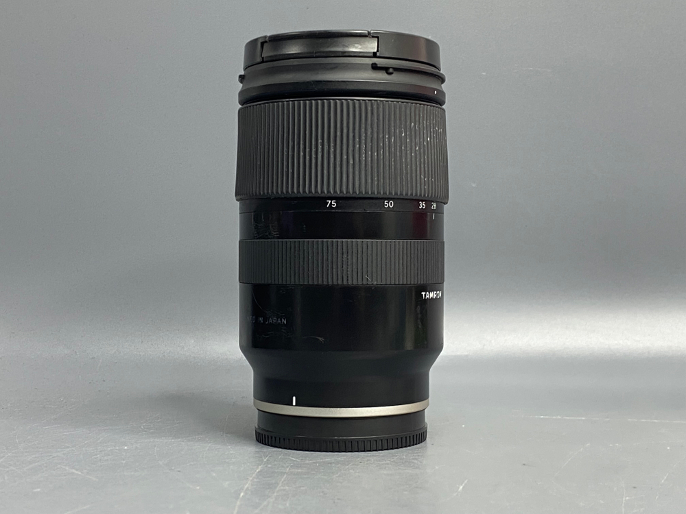 Tamron 28-75mm 2.8 Di III RXD Sony E пыль внутри линзы