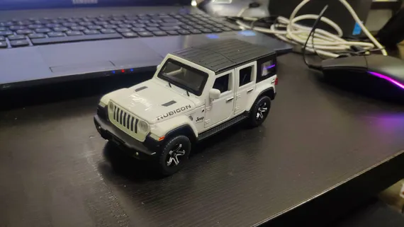 Машинка металлическая инерционная 1:32 Jeep Wrangler Rubicon 15,5 см D21003